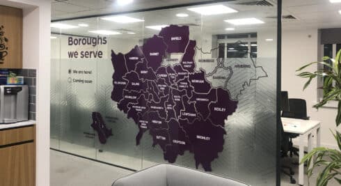 cut vinyl design of a map of london on a glass partition wall