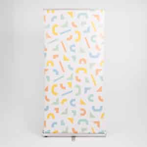 silver roller banner stand with geometric printed pattern