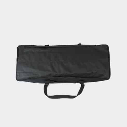 A black carry bag for a fabric pop up stand